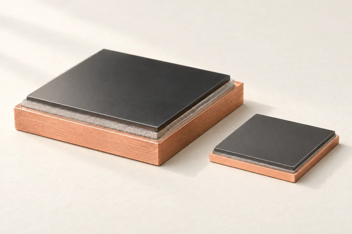 Bonded semiconductor and diamond coupons showing their layered edges
